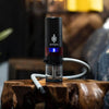 Hitoki Trident Laser Bong On The Wood Table - Insomnia Smoke