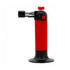 A handheld Blazer Hot Shot MT-3000 Butane Refillable Micro Torch lighter with a ribbed red body, black base and nozzle, and red accents, shown on a plain white background.