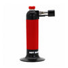 A portable Blazer Hot Shot MT-3000 Butane Refillable Micro Torch lighter with a black body, a textured red ribbed grip, a red ignition cap, and a black nozzle, shown on a plain white background.
