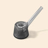 A NWTN Home dark gray ribbed glass smoking pipe with a long angled stem, shown on a solid light beige background.