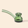 A translucent green glass water pipe by NWTN Home with a curved mouthpiece and a double-bulb base, shown on a solid light beige background.