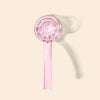 A translucent pink glass hand pipe with a flat circular bowl and a long handle, shown on a warm cream background with a soft shadow.